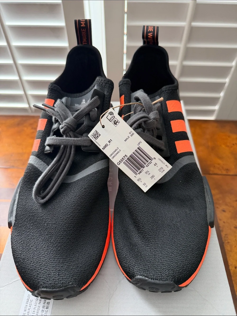 adidas Men’s Black Sneakers with Bright Orange Stripes